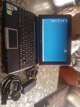 ASUS Eee 1000H + cargador y maletín