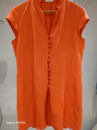Chaqueta naranja sin mangas
