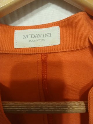 Chaqueta naranja sin mangas
