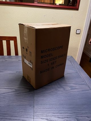 Microscopio Swift SW350T con muestras.