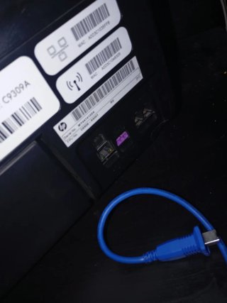 Impresora HP Negra con Tintas casi sin gasrar