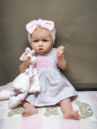 Muñeca niña realista 55cm