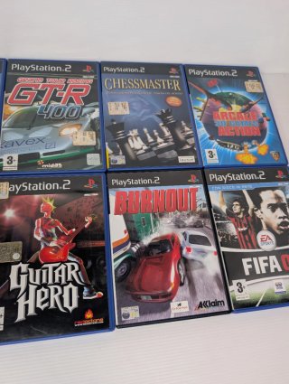 Lotto 10 Giochi PS2 - FIFA 07, Burnout, Guitar Her
