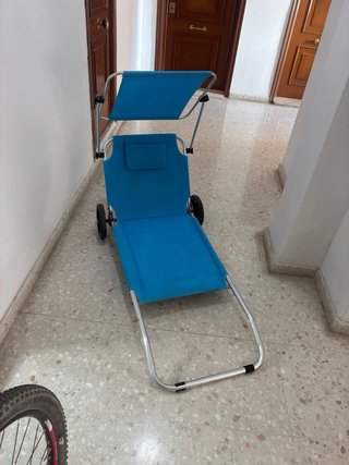 Tumbona plegable con ruedas y convertible en carr