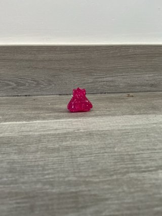 Figura rosa con purpurina juguete plástico