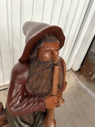Figura de madera antigua músico