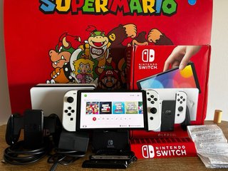 Nintendo Switch OLED 10/10 PERFECTA. Con accesorio