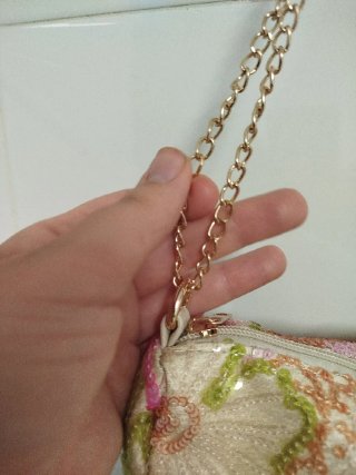 Bolso de lentejuelas floral con cadena dorada
