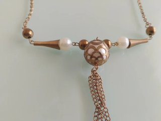 Conjunto collar, pulsera y pendientes dorados