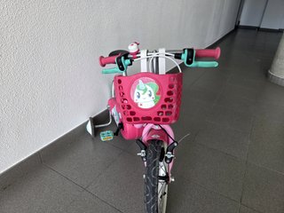 Bici infantil B'Twin 14 rosa con cesta