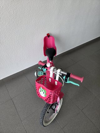 Bici infantil B'Twin 14 rosa con cesta
