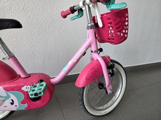 Bici infantil B'Twin 14 rosa con cesta
