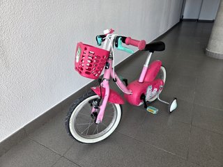 Bici infantil B'Twin 14 rosa con cesta