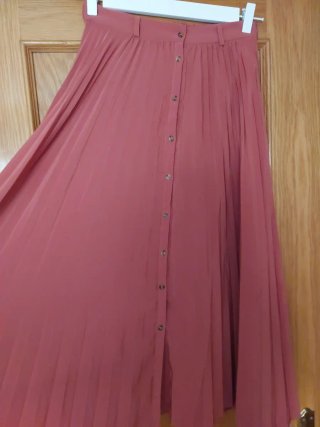 Falda plisada coral talla L