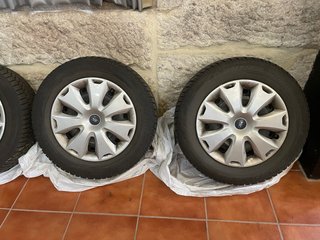 Juego Llantas Ford 16 con tapacubos