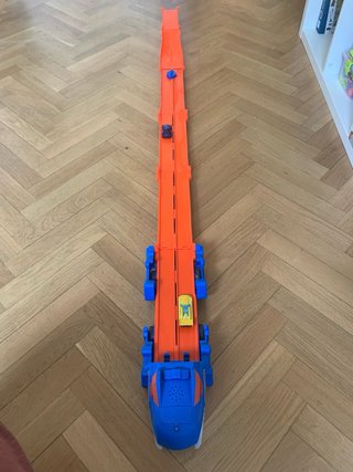 Camión Transportador Dinosaurio con Pista