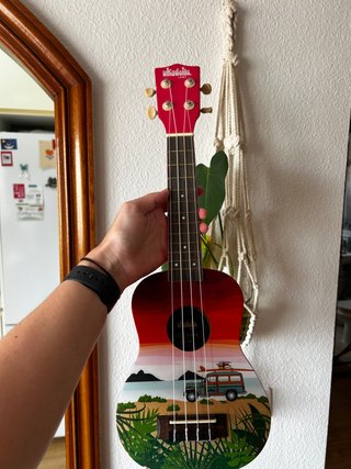 Ukelele Uladelic con diseño tropical