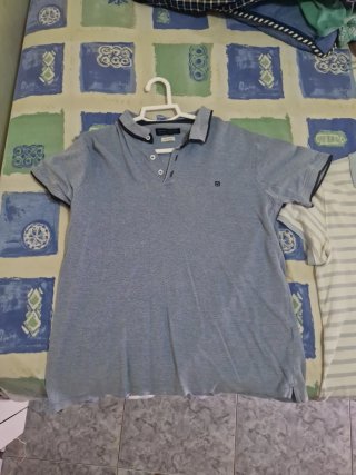 Polo  azul marino en buen estado