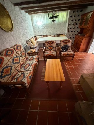 Sofá y 2 sillones con estampado étnico