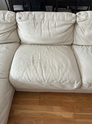 Sofá seccional de cuero beige