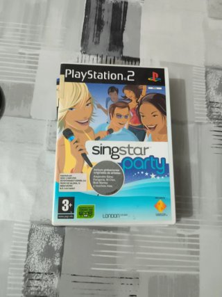 Micros SingStar + 4 juegos PS2