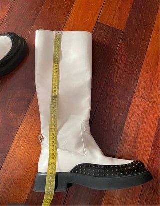 Botas altas Tod's piel blancas con suela negra