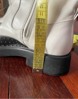 Botas altas Tod's piel blancas con suela negra