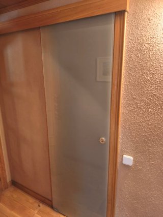 Puerta corredera de cristal