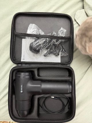 Pistola de masajes con 6 cabezales