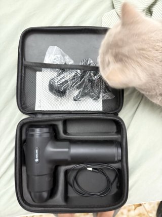 Pistola de masajes con 6 cabezales