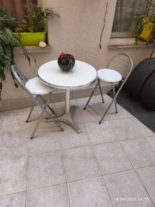 Mesa y 2 sillas terraza plegables