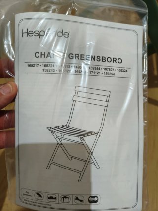 Sillas de metal verdes plegables