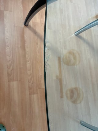 Mesa de centro cristal y metal ovalada