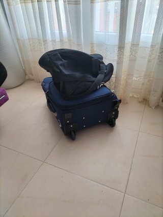 Bolso de patines y maleta de viaje