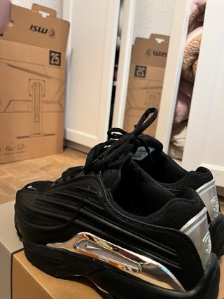Nike NOCTA negras plateadas