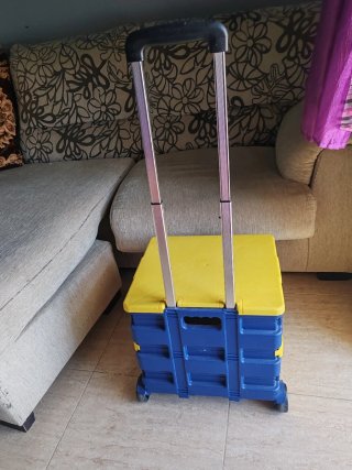 Carro de compra plegable azul y amarillo