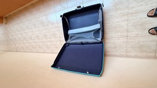 Maleta azul de viaje
