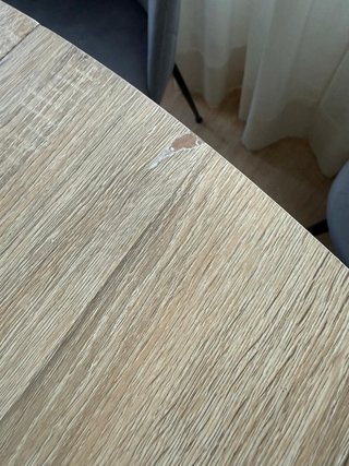 Mesa de comedor ovalada de madera