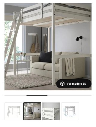 Cama alta grande con colchón.