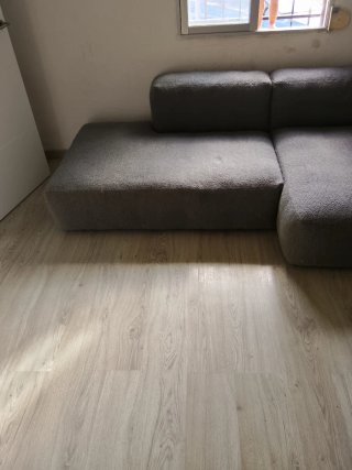 Sofá modular gris de tela