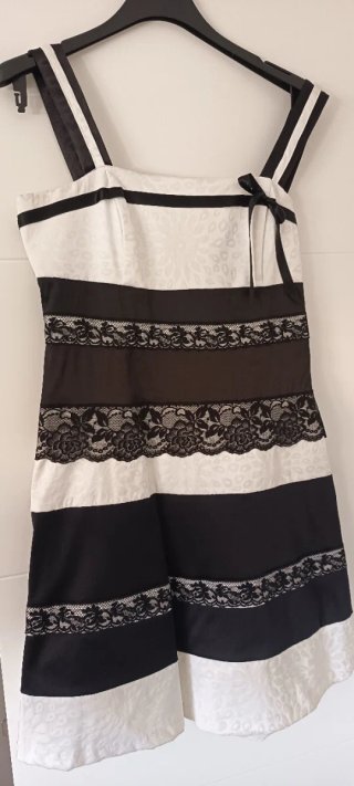 Vestido fiesta blanco y negro con torera a juego
