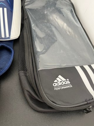 Pack Espinilleras Adidas y Brazalete Real Madrid