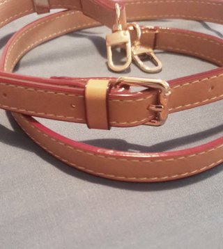 Correa ajustable de bolso .