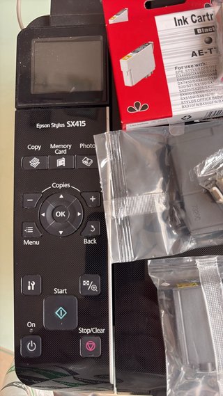 Impresora Epson Stylus SX415 mas 19 cartuchos