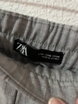 Pantalón gris pinzas talla M