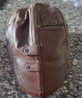 Gorra de tweed gris con cuadros y marron