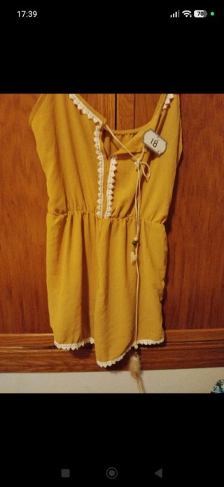 Mono amarillo con etiqueta talla L