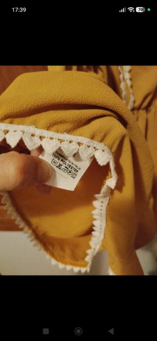 Mono amarillo con etiqueta talla L