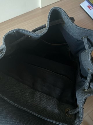 Mochila de lona gris con detalles marrones nueva