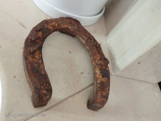 Ferro di cavallo vintage con chiodi